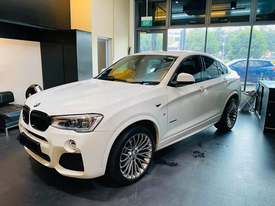 White BMW X4 coupe-SUV after window tinting at Infratint Singapore