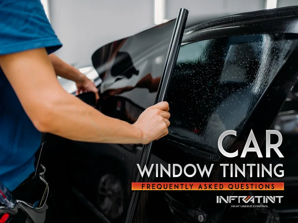 Installer applying dark window tint film to a car door, Infratint car window tinting FAQ banner