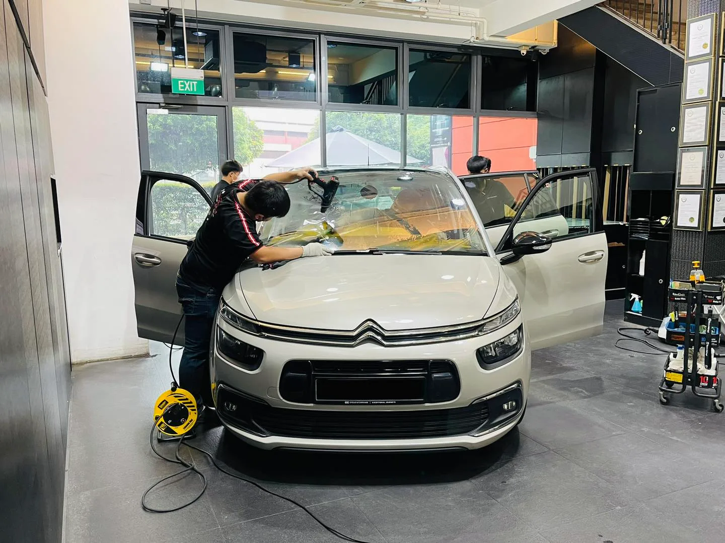 Beige Citroen C4 MPV having window film fitted at Infratint Singapore