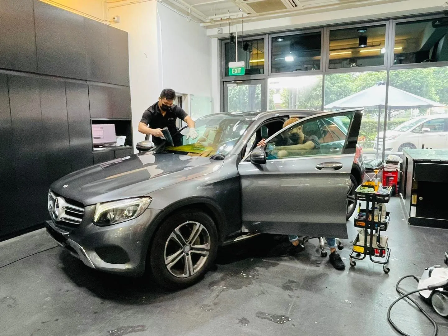 Grey Mercedes-Benz GLC SUV during window tinting at Infratint Singapore