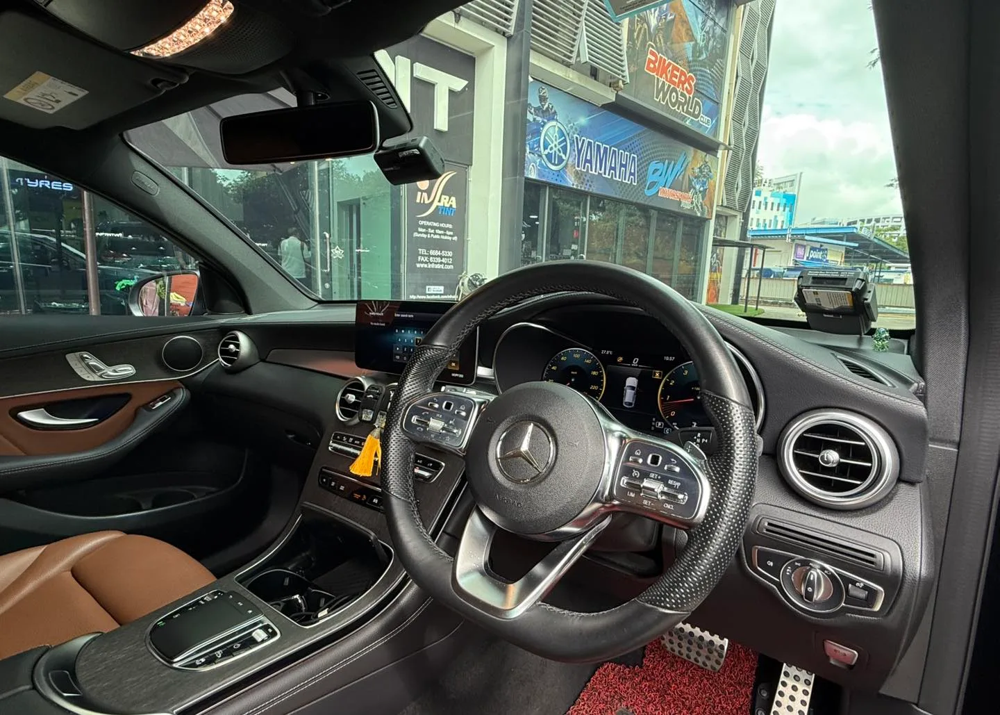 Black Mercedes-Benz GLC300 Coupe rear three-quarter view outside Infratint Singapore