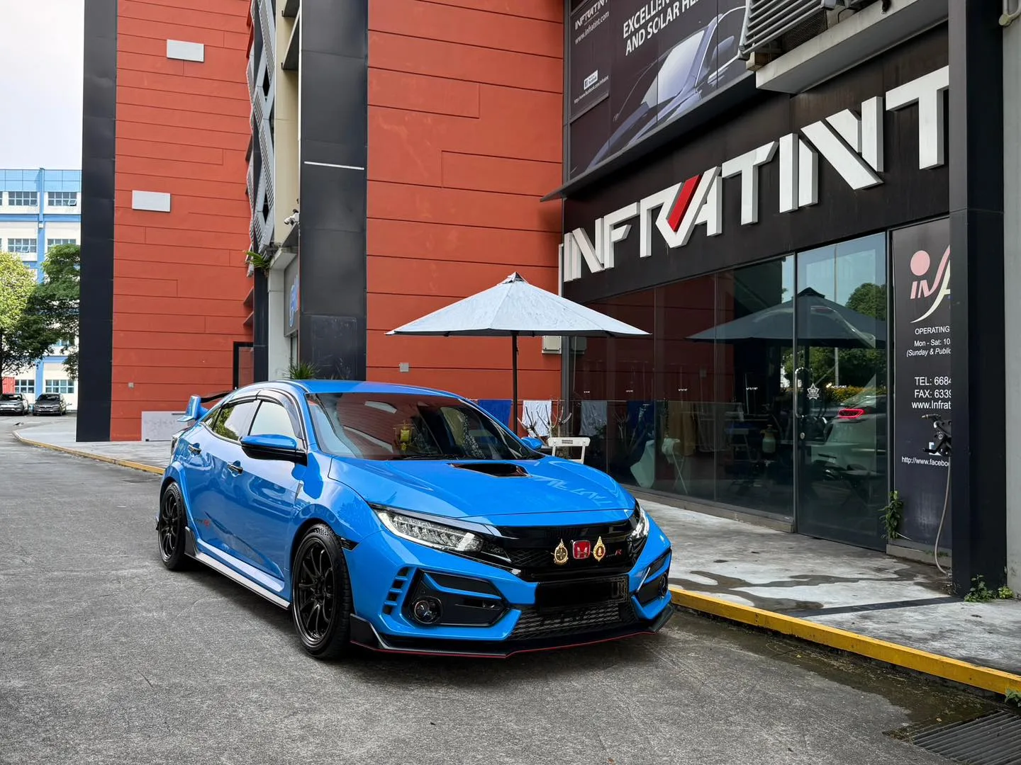 Blue Honda Civic Type R front three-quarter view outside Infratint Singapore