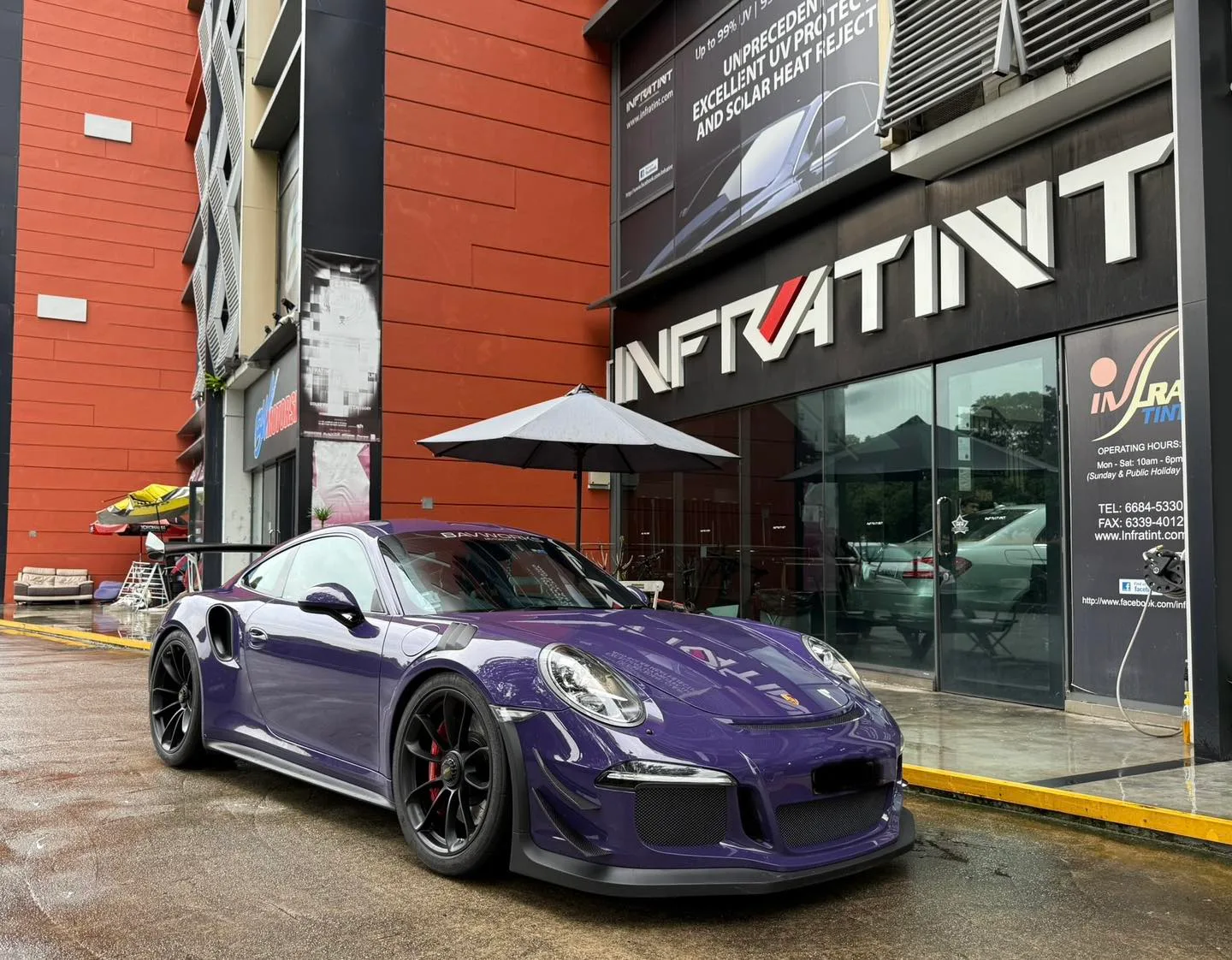 Tinted purple Porsche GT3 RS front three-quarter view at Infratint Singapore