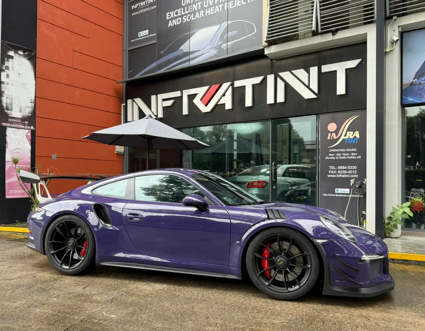 Tinted purple Porsche GT3 RS side profile outside Infratint Singapore