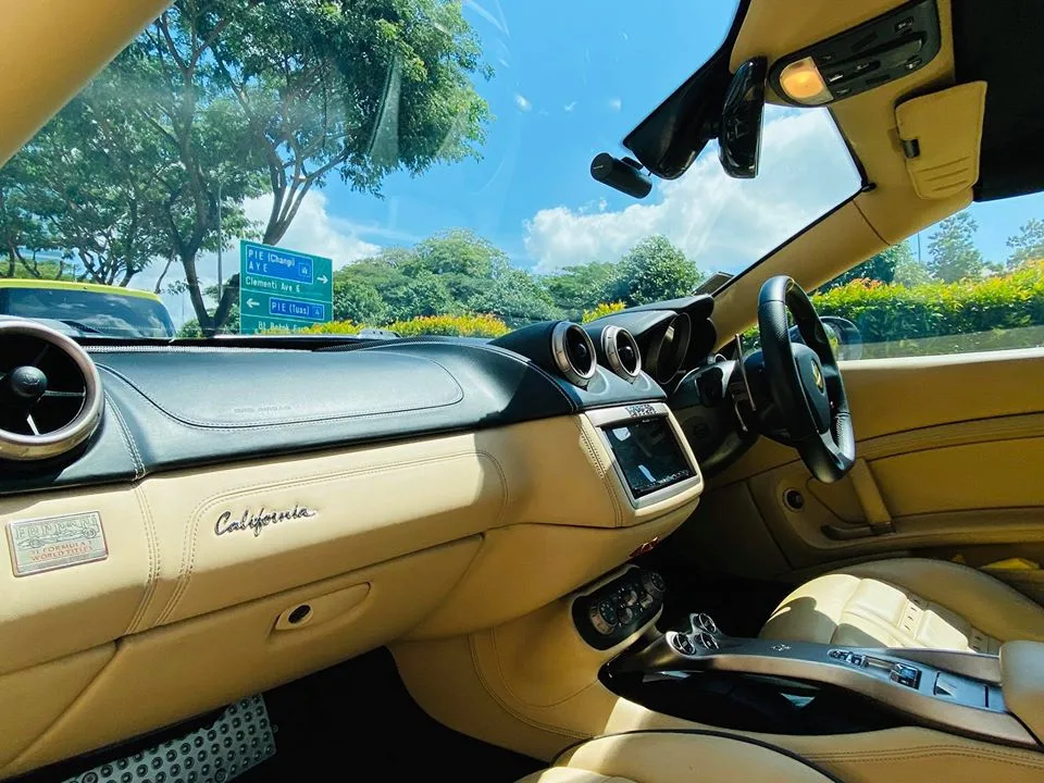 Tan interior of a Ferrari California looking through the tinted windscreen at Infratint Singapore