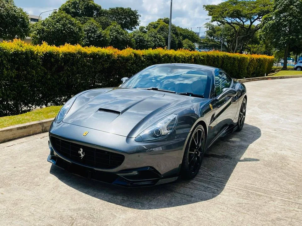 Grey Ferrari California convertible front three-quarter at Infratint Singapore