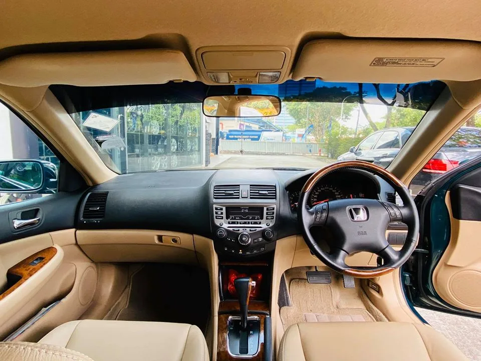 Honda Accord beige leather dashboard seen through tinted windscreen at Infratint Singapore