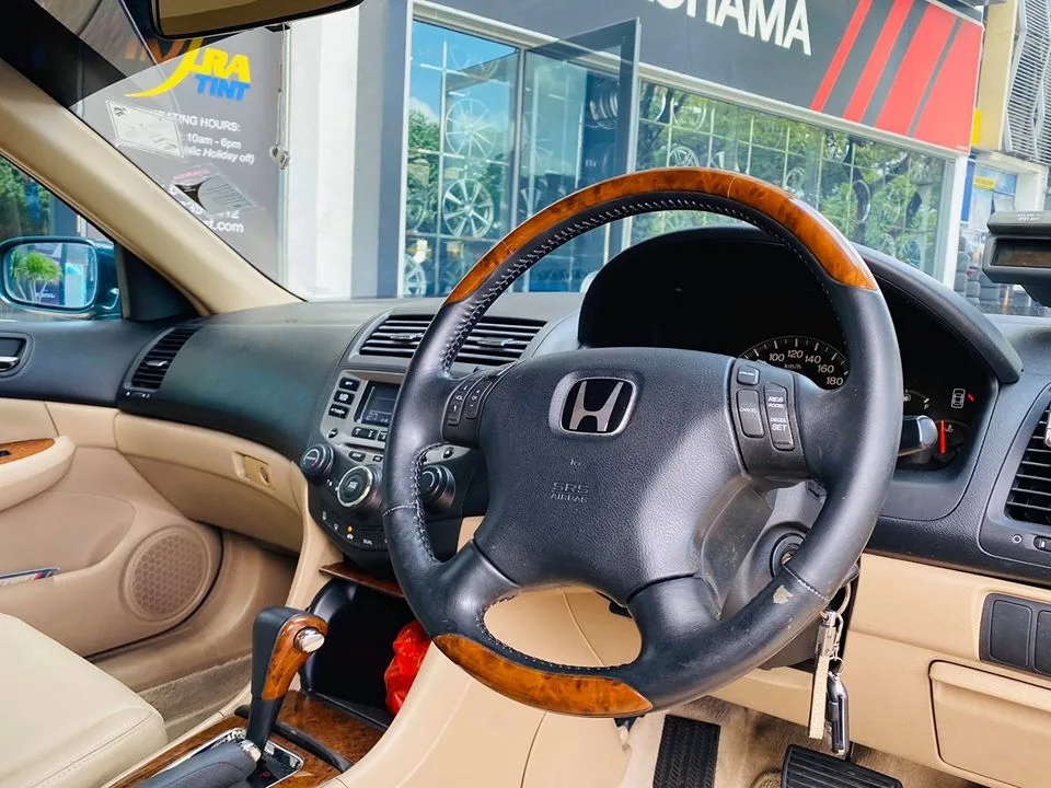 Honda Accord wood-trim steering wheel and beige interior at Infratint Singapore
