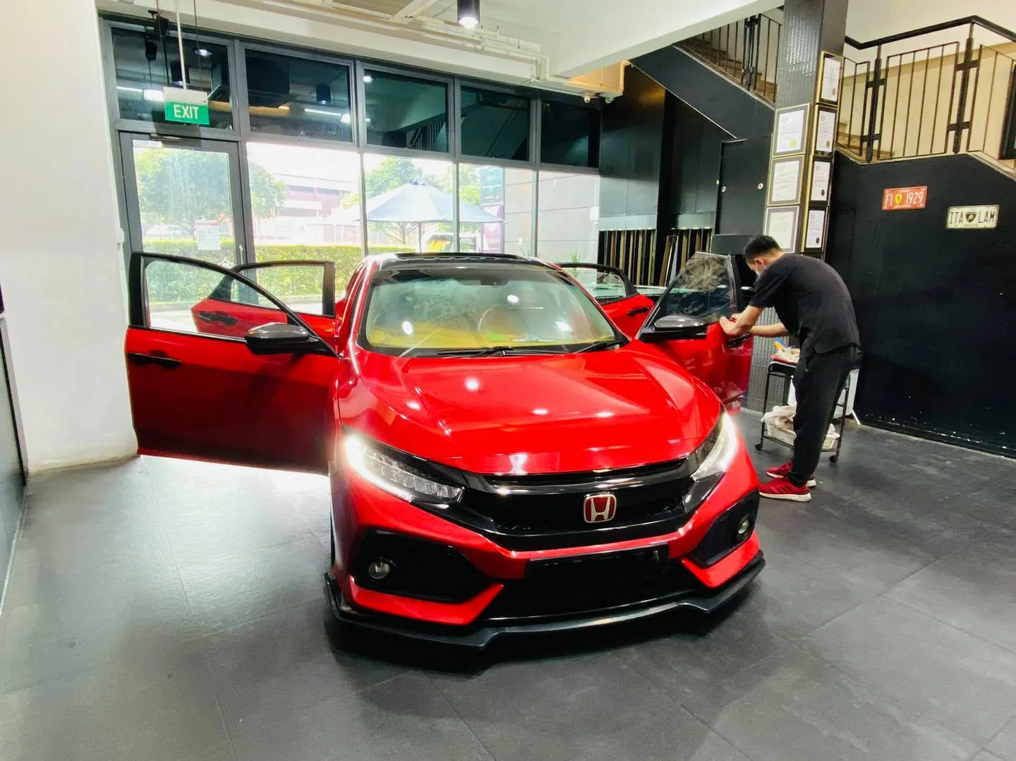 Red Honda Civic having window film fitted at Infratint Singapore