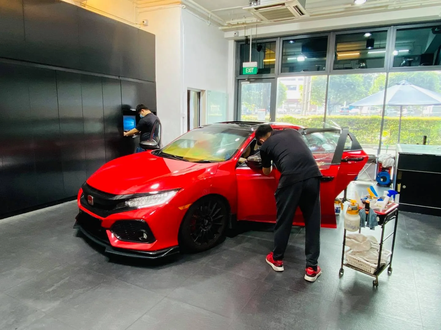 Red Honda Civic Type R getting window film installed at Infratint Singapore