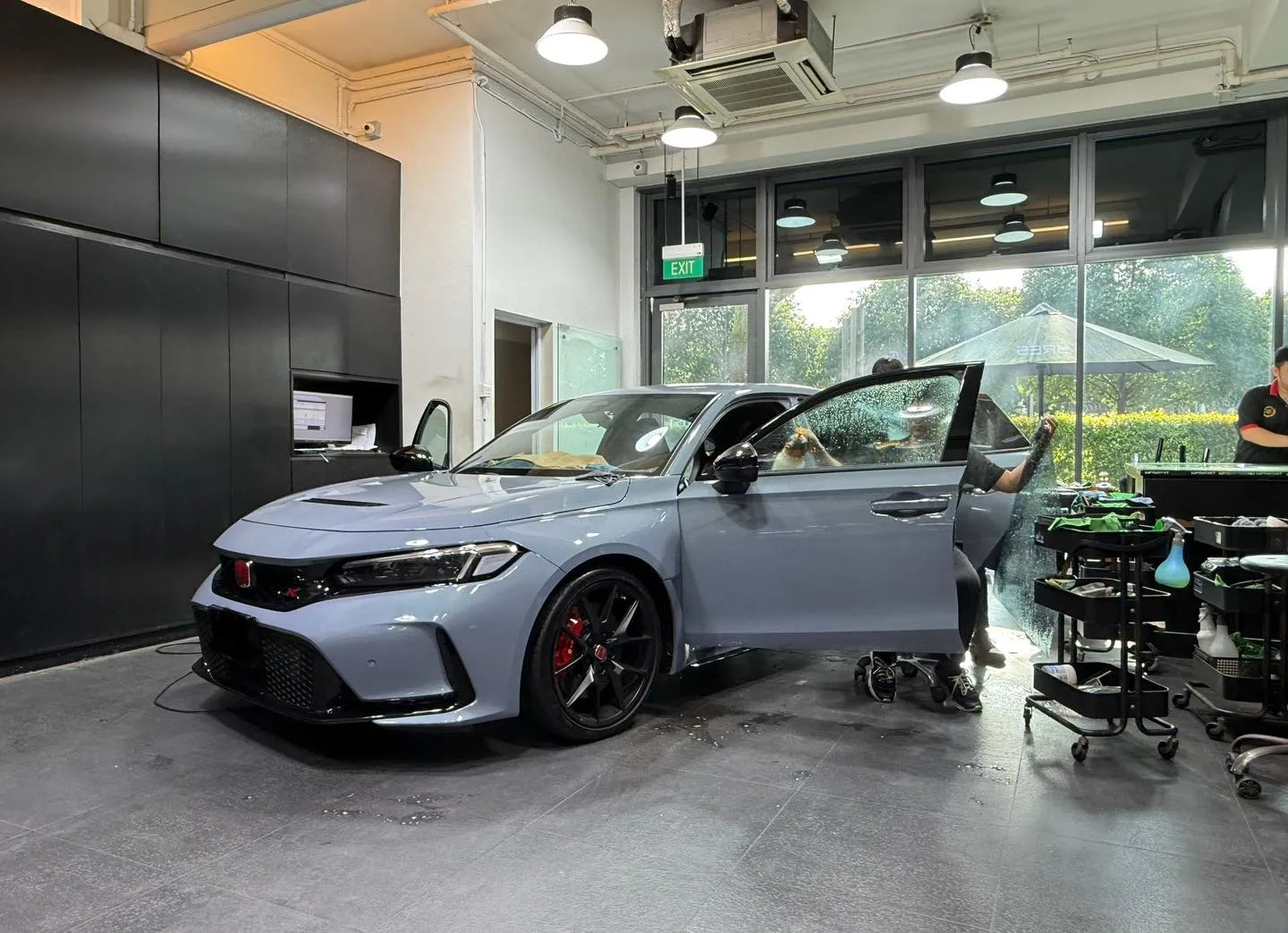 Technician installing window film on a Honda Civic Type R FL5 at Infratint Singapore