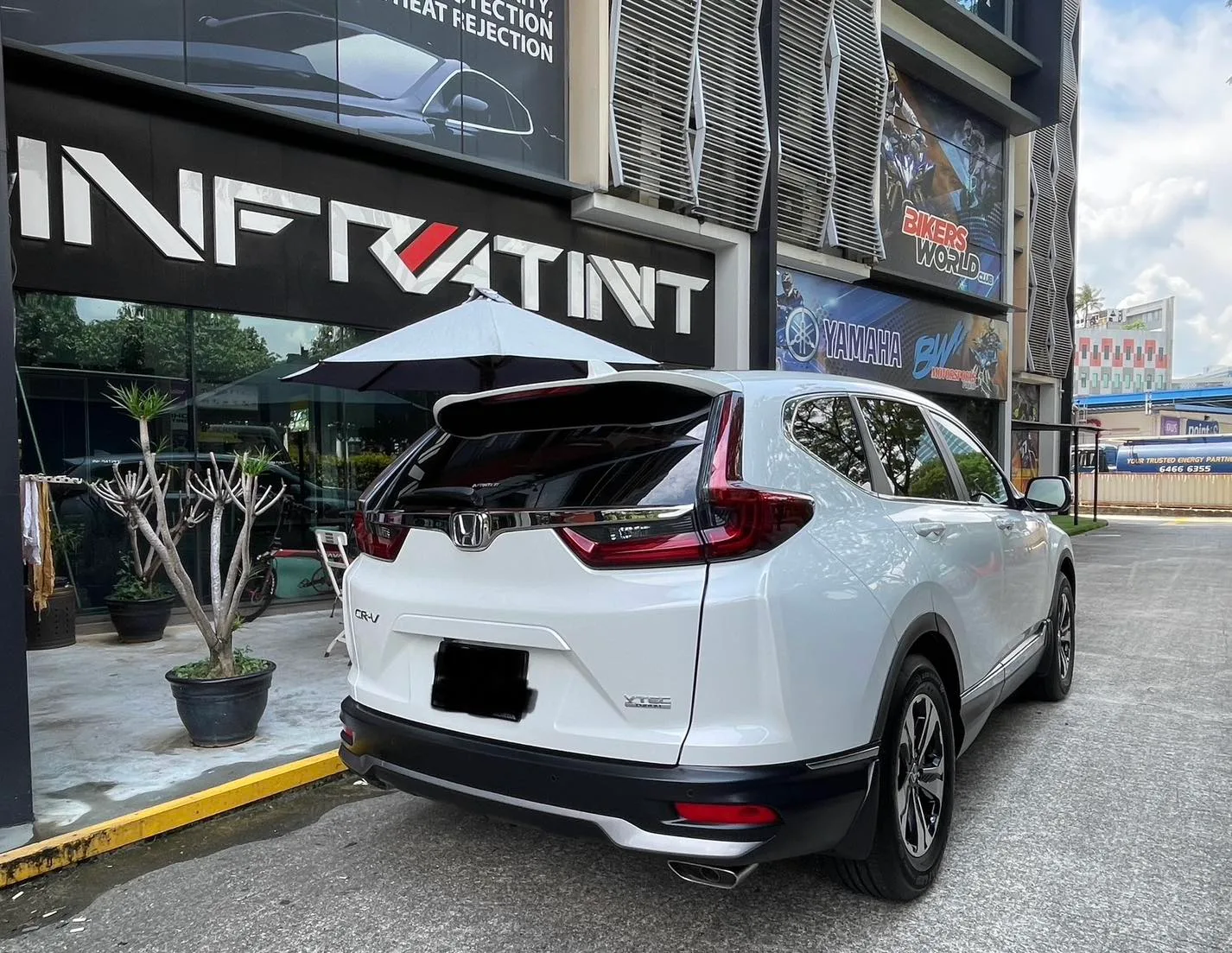 White Honda CR-V rear three-quarter view with tinted glass at Infratint Singapore