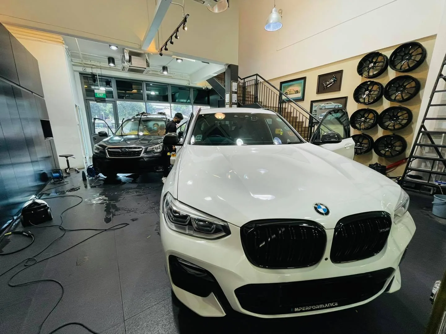 White BMW X3 front view in the showroom at Infratint Singapore