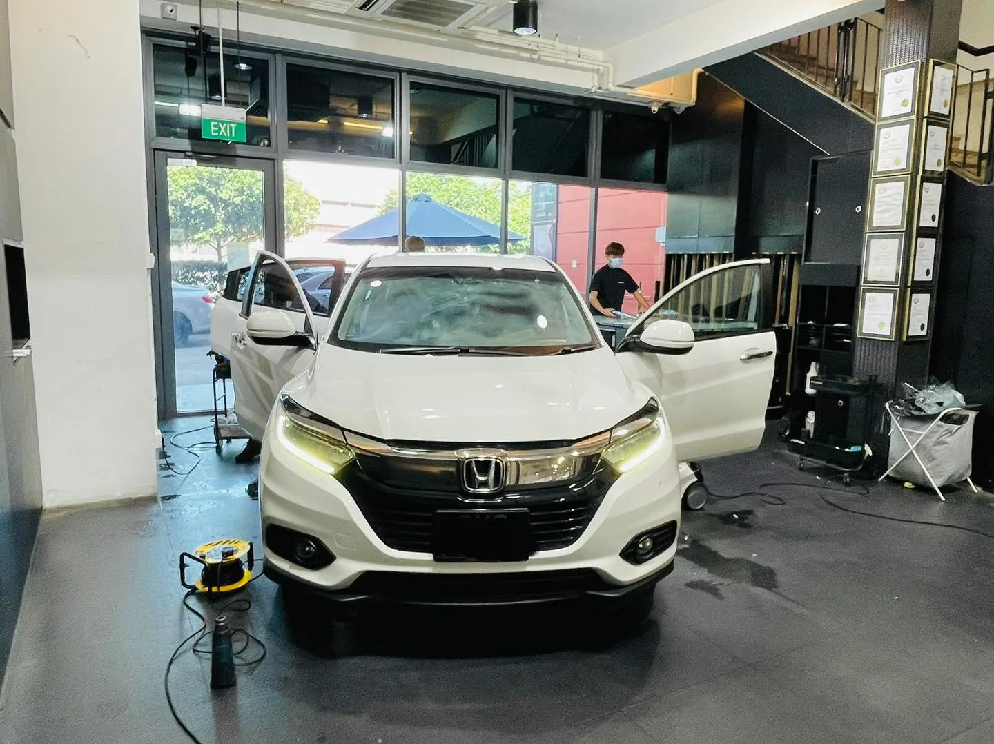 White Honda SUV having its windows tinted at Infratint Singapore