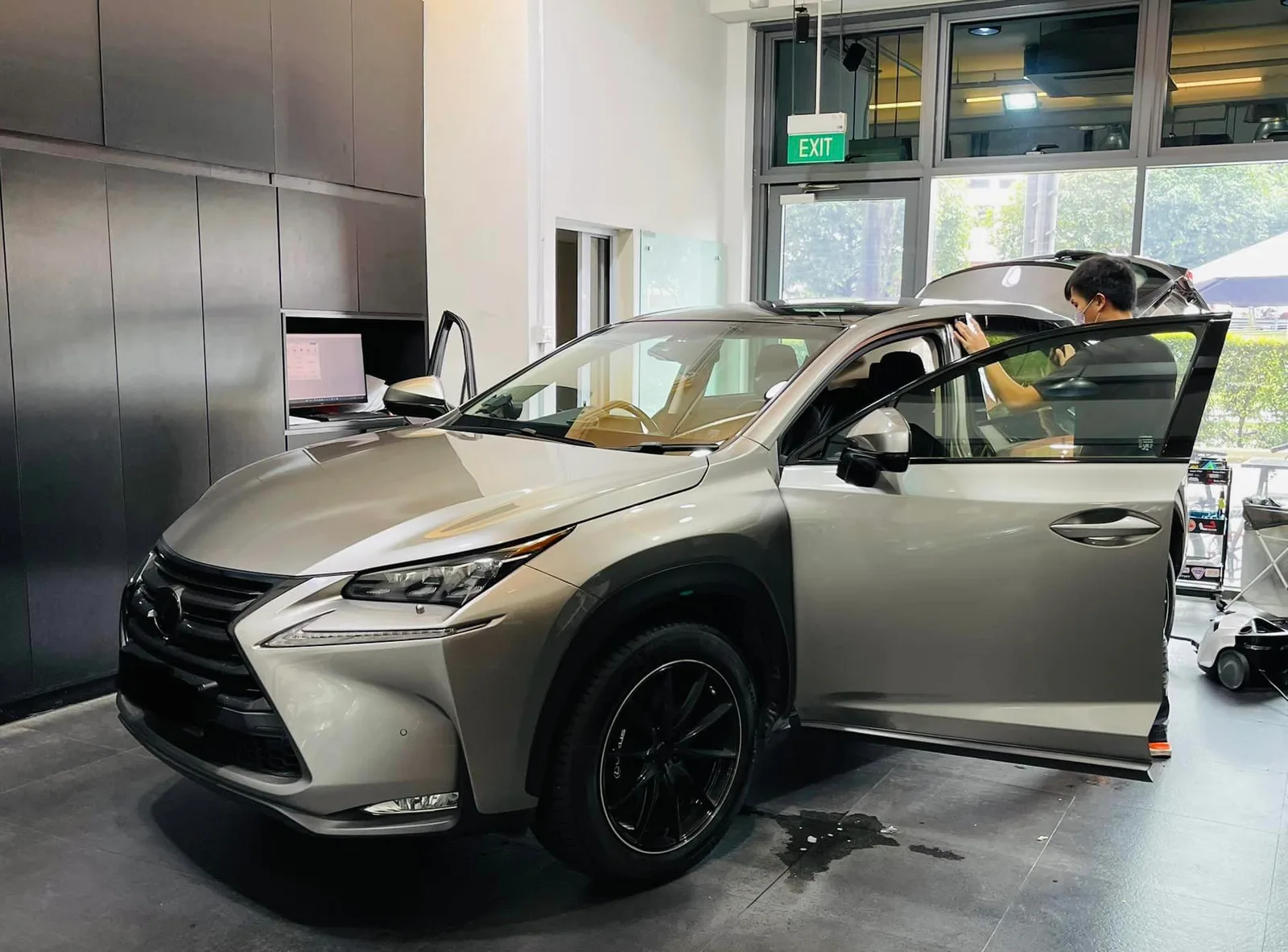 Champagne Lexus NX SUV having window film applied at Infratint Singapore