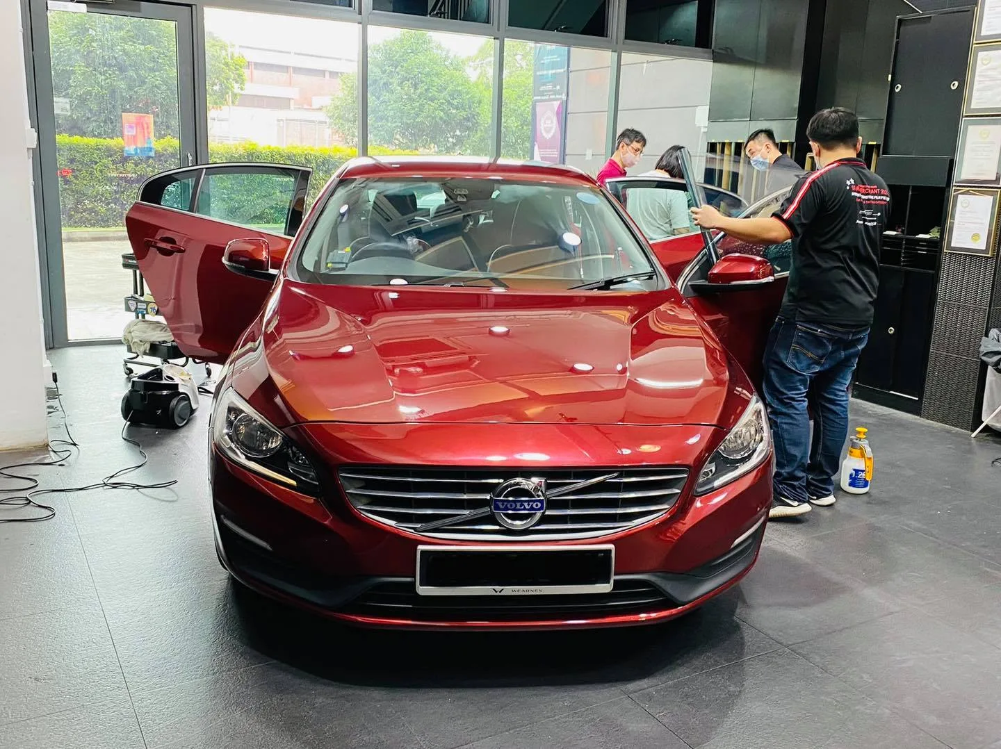 Red Volvo S60 having window film fitted at Infratint Singapore