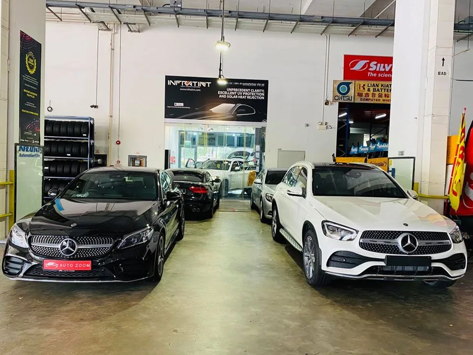 Black Mercedes-Benz C-Class and white Mercedes-Benz GLC at Infratint Singapore