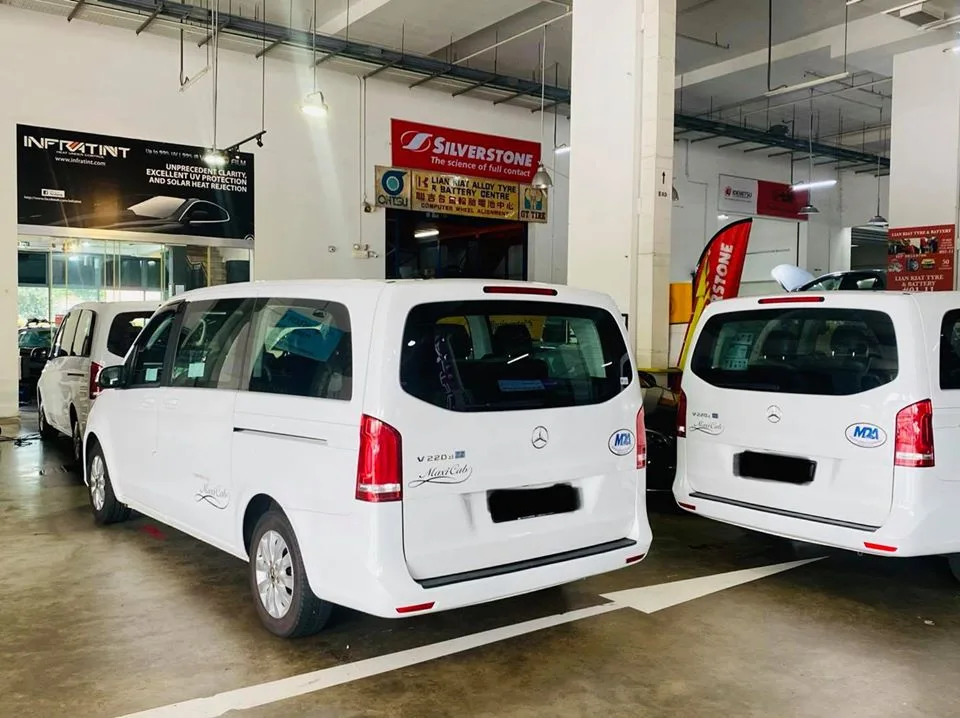 Pair of white Mercedes-Benz vans at Infratint Singapore for window film