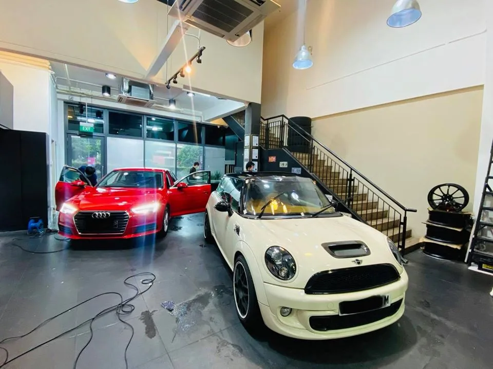 Red Audi R8 and cream Mini Cooper convertible at Infratint Singapore for window film