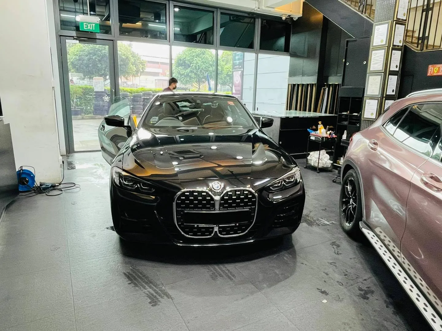 Black BMW 4-Series coupe at Infratint Singapore for window film installation