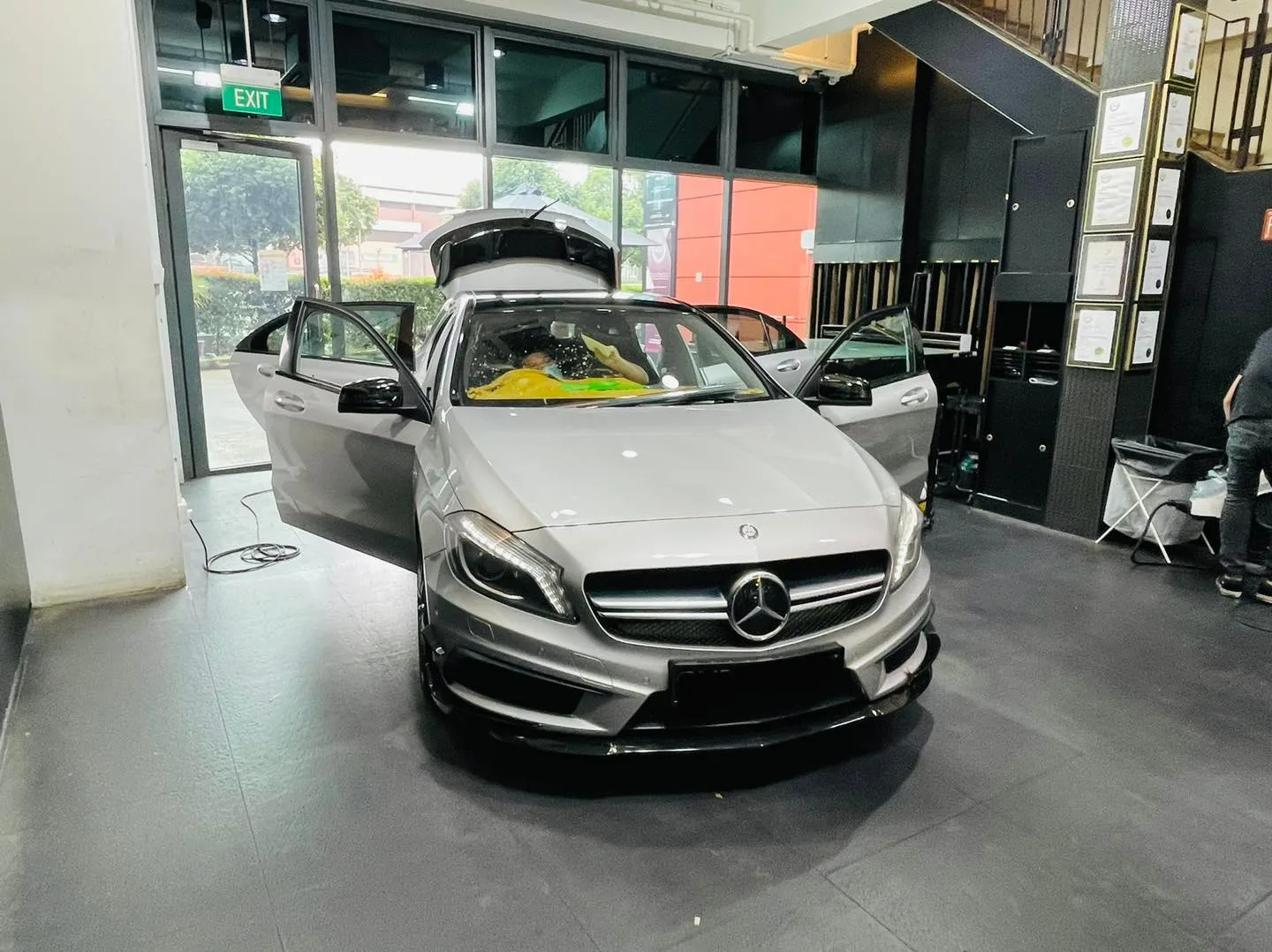 Silver Mercedes-Benz A45 AMG during window film installation at Infratint Singapore