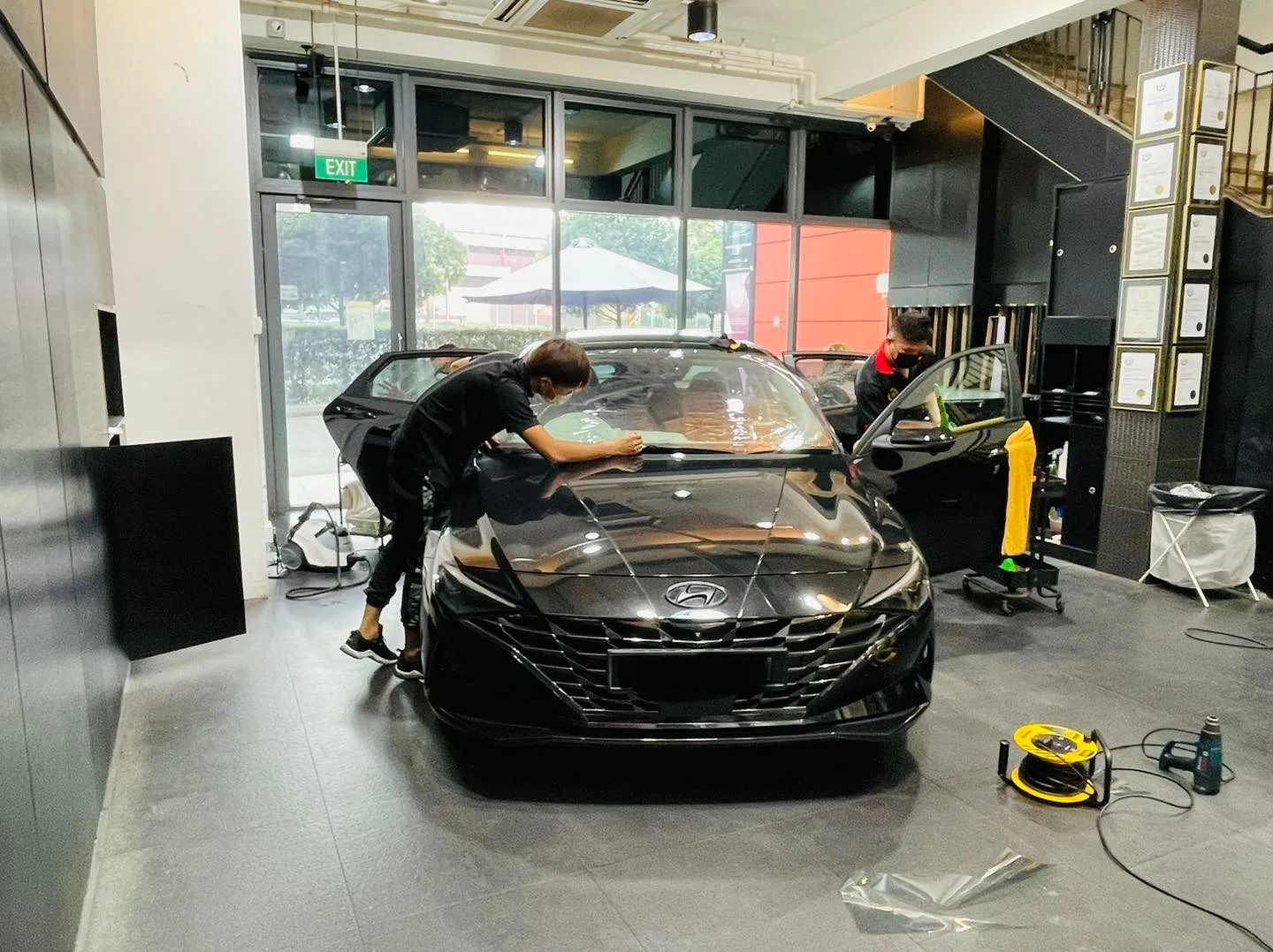 Black Hyundai sedan having window film fitted at Infratint Singapore