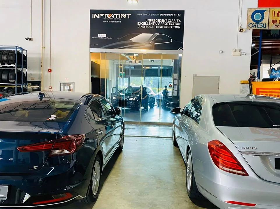 Dark blue Hyundai sedan and silver Mercedes-Benz S-Class at Infratint Singapore