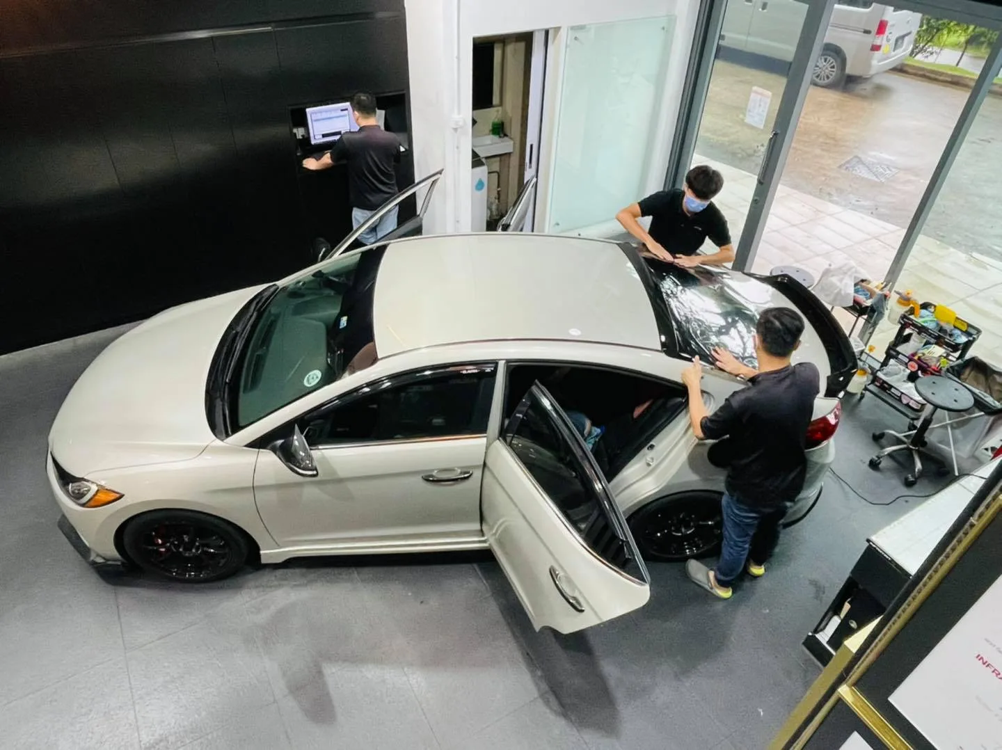Overhead view of a Hyundai Elantra having rear window film fitted at Infratint Singapore