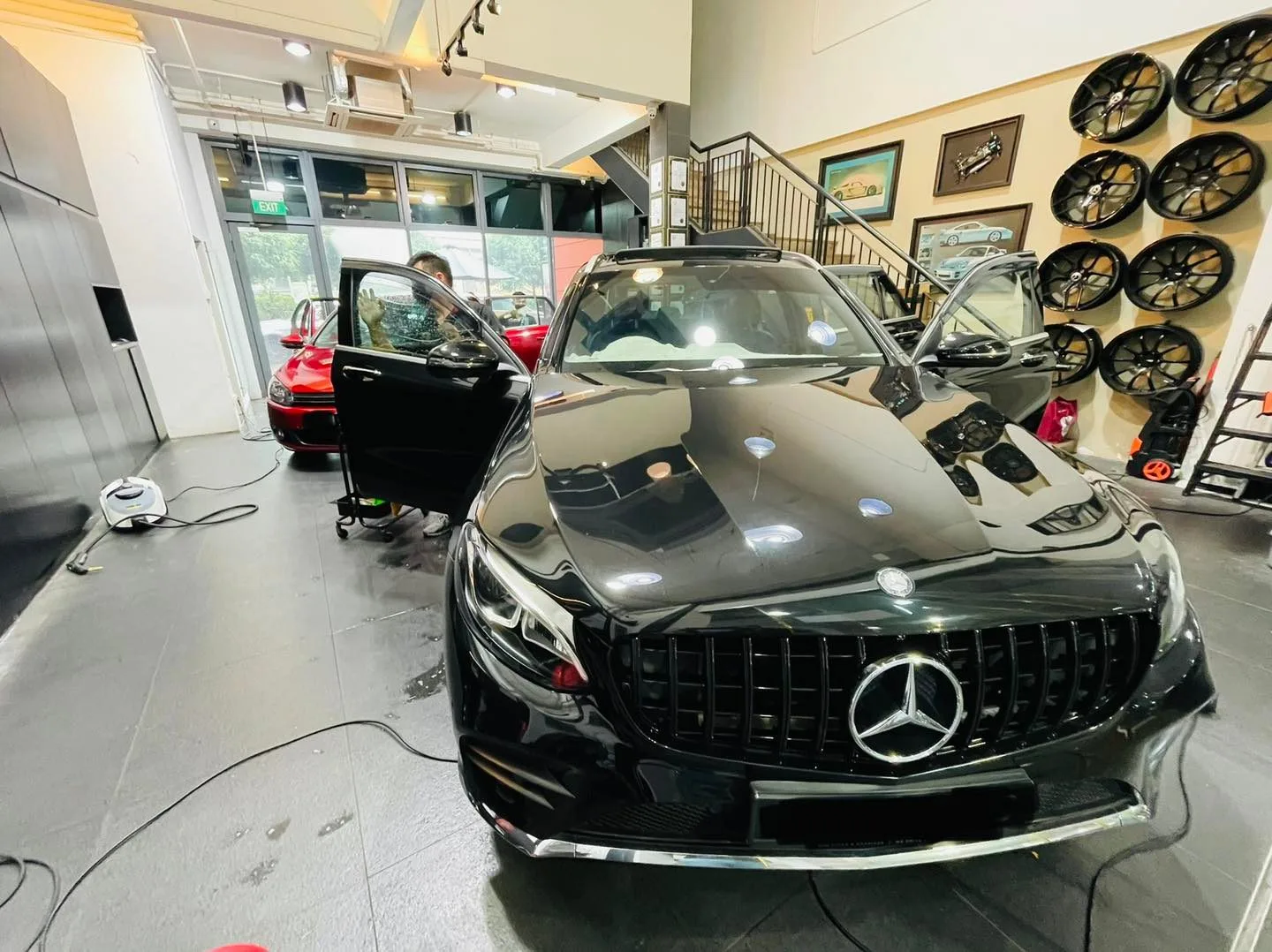 Black Mercedes-Benz SUV during window tinting at Infratint Singapore