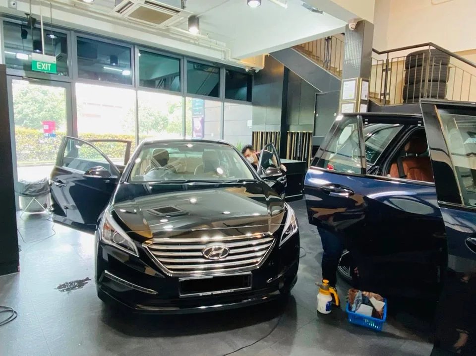 Black Hyundai Sonata getting window film fitted at Infratint Singapore