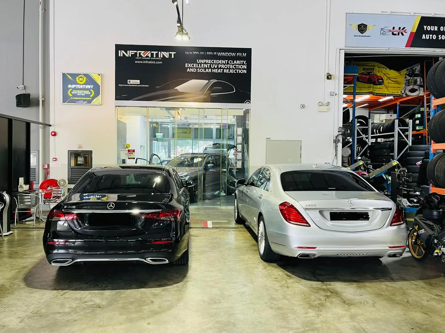 Black Mercedes-Benz E-Class and silver S-Class inside Infratint Singapore