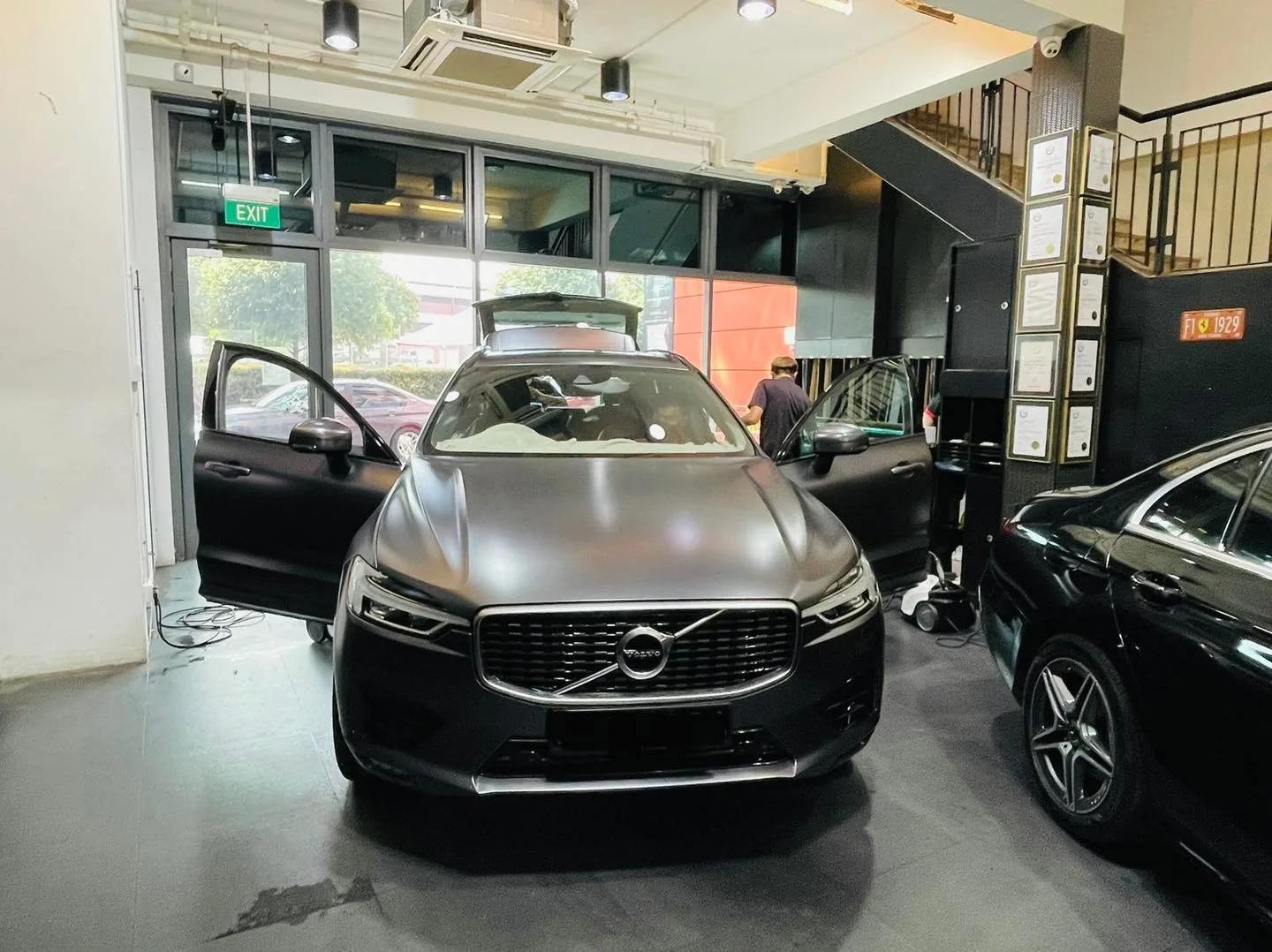 Grey Volvo XC60 with roof box having windows tinted at Infratint Singapore