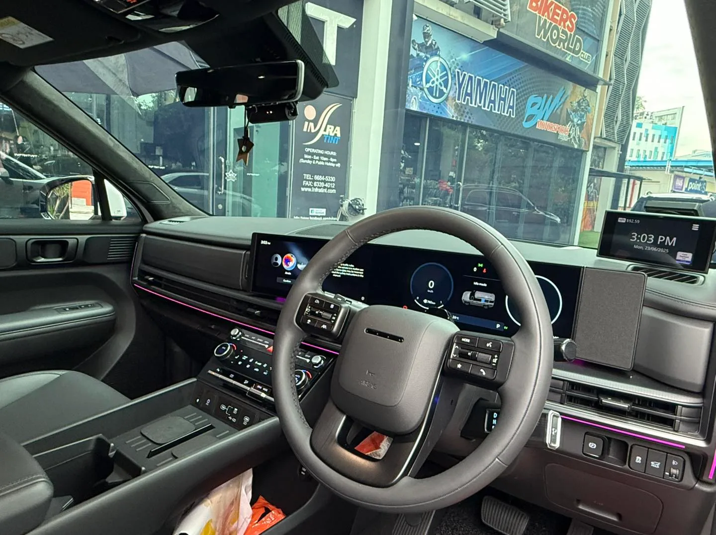 Hyundai Santa Fe dashboard and steering wheel seen through tinted glass at Infratint Singapore