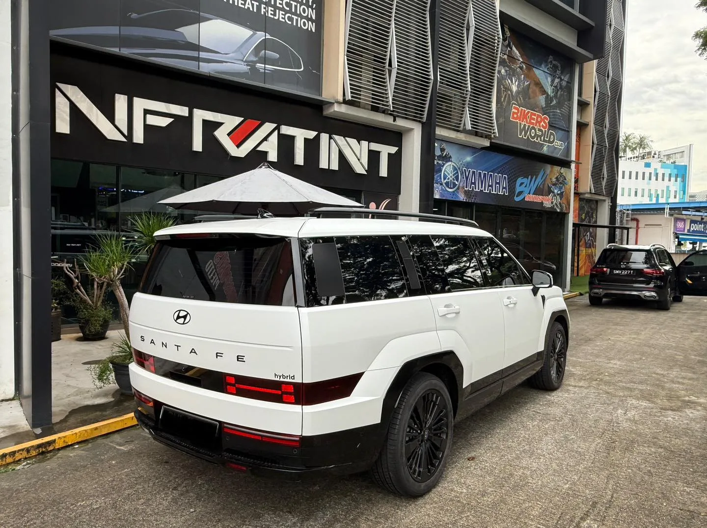 White Hyundai Santa Fe rear three-quarter with tinted glass at Infratint Singapore