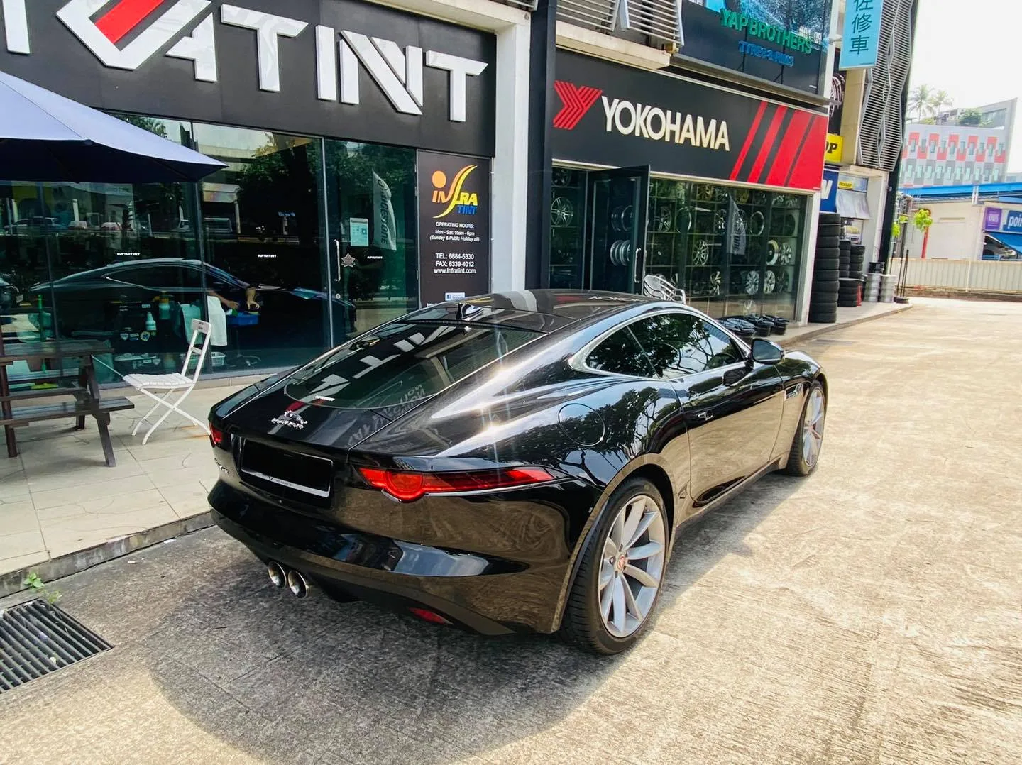 Black Jaguar F-Type rear view outside Infratint Singapore