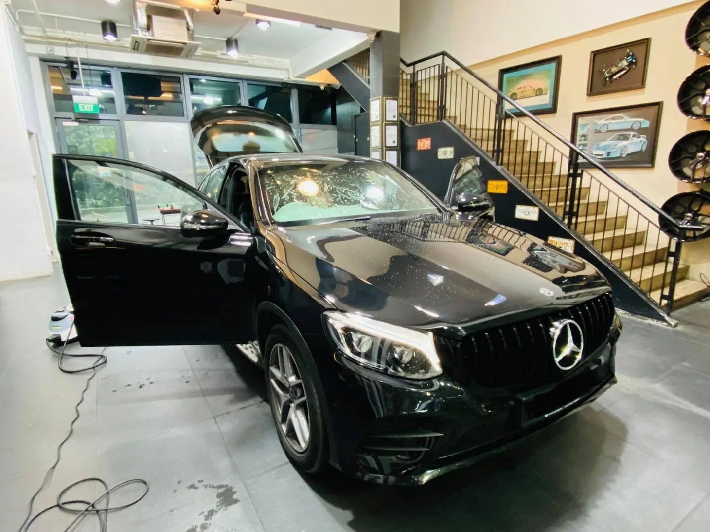 Black Mercedes-Benz GLC in the showroom at Infratint Singapore