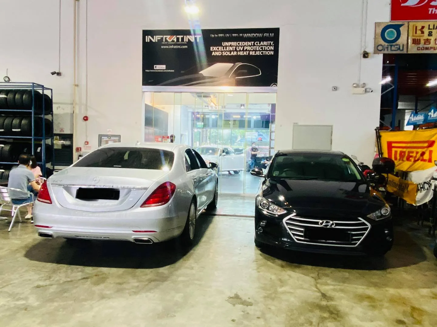 Silver Mercedes-Benz S-Class and black Hyundai Elantra at Infratint Singapore