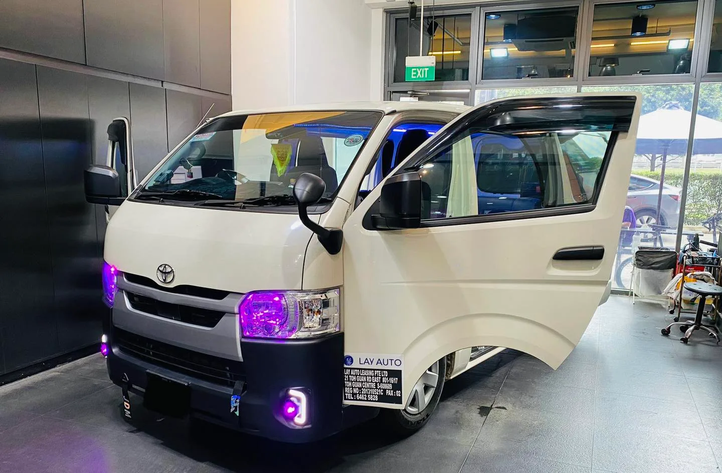 White Toyota Hiace van at Infratint Singapore for window film