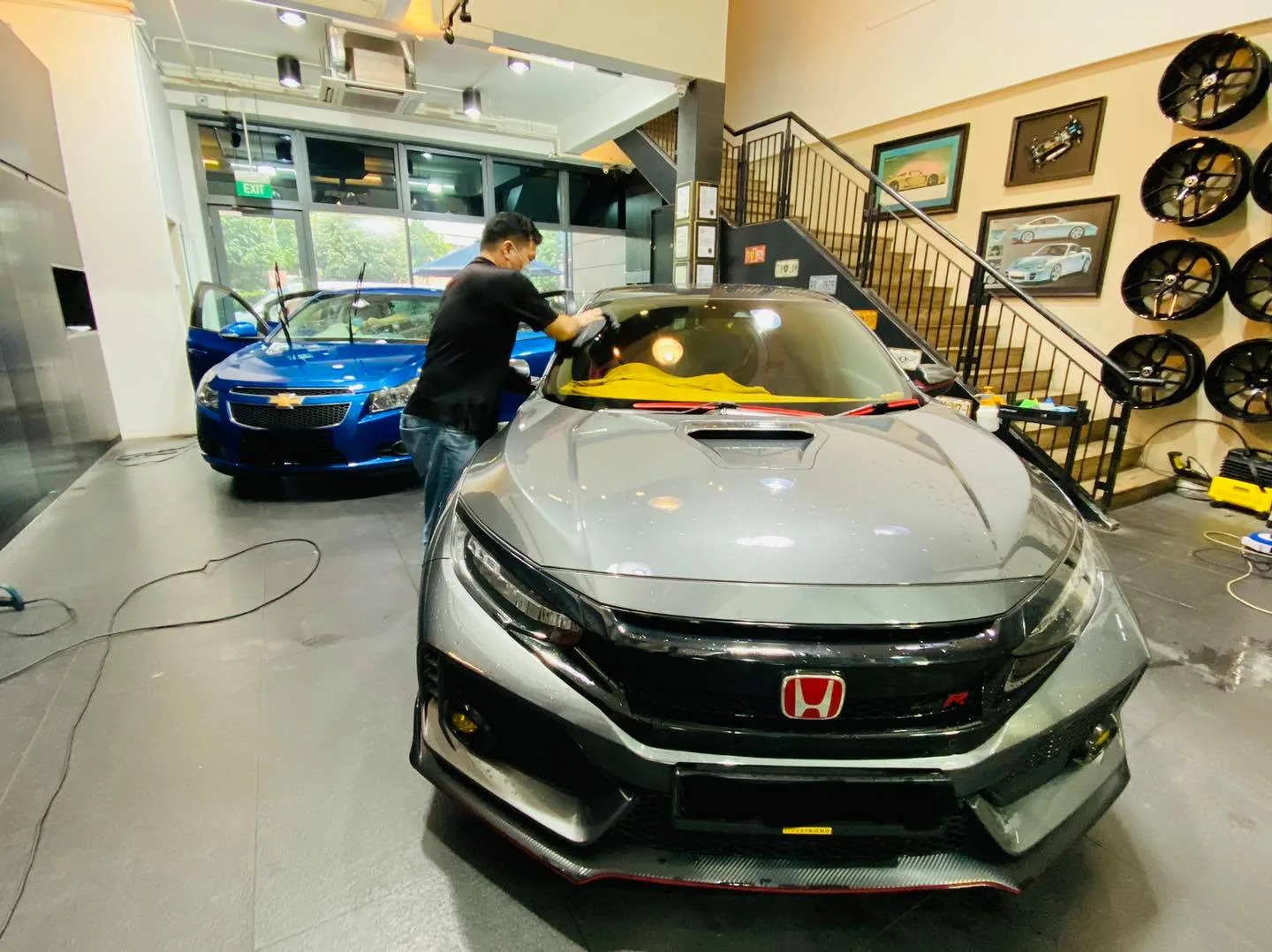 Grey Honda Civic Type R and blue Chevrolet Cruze being tinted at Infratint Singapore