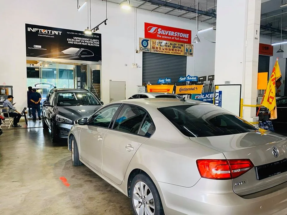 Silver Volkswagen Jetta parked in the Infratint Singapore workshop for tinting