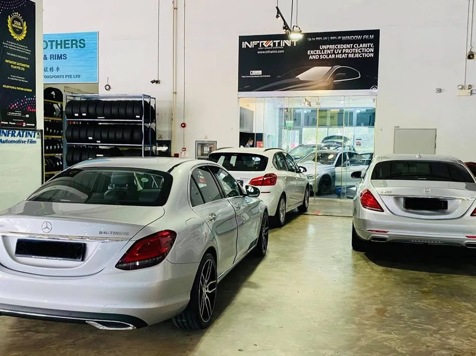 Silver Mercedes-Benz C-Class and S-Class sedans lined up at Infratint Singapore
