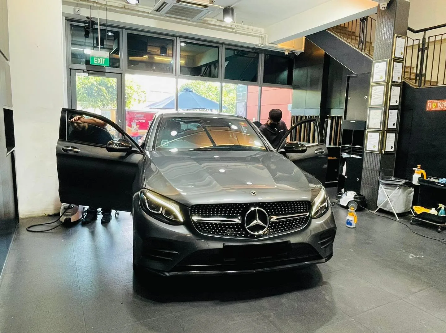 Grey Mercedes-Benz GLC SUV with door open during window tinting at Infratint Singapore