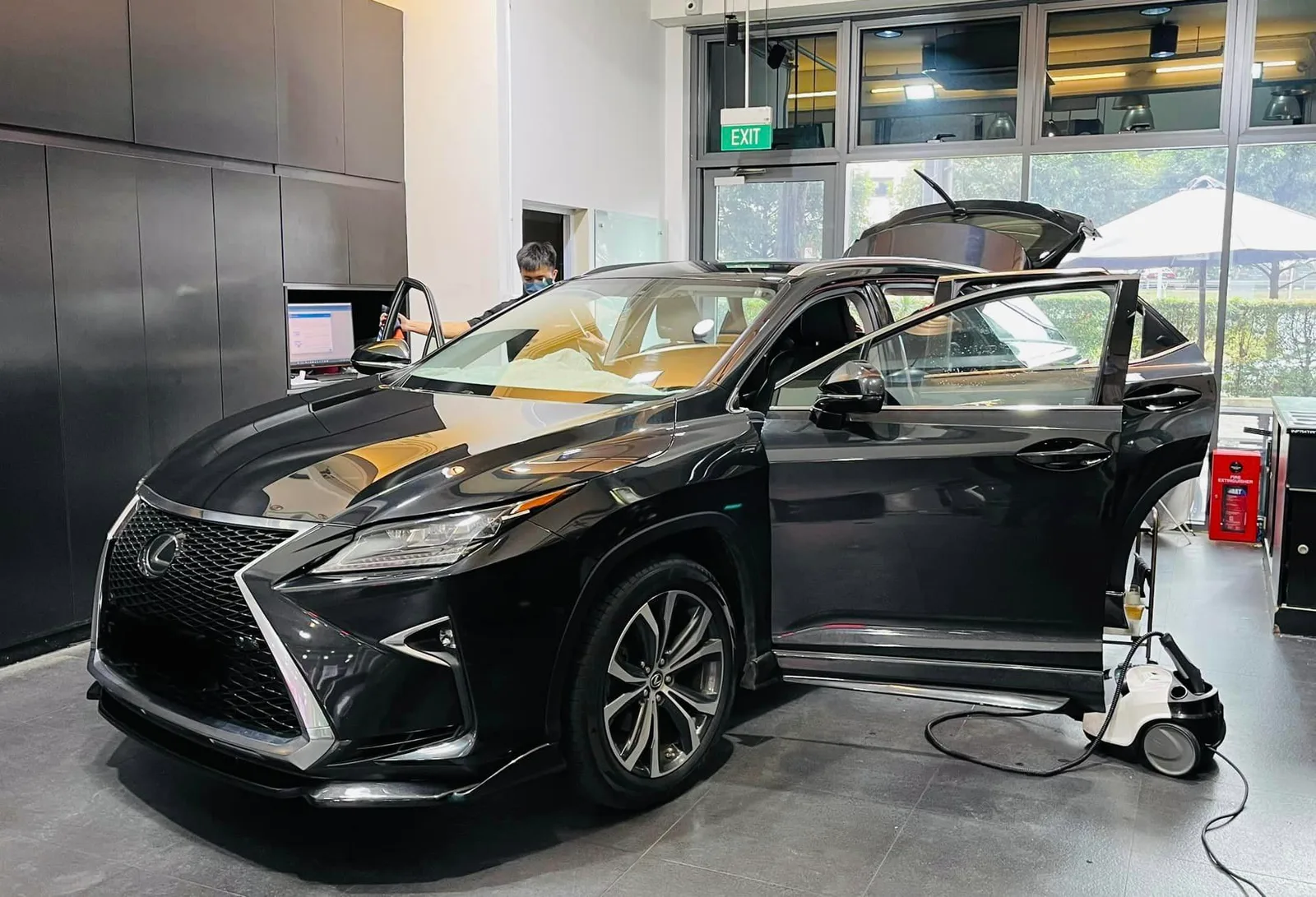 Black Lexus SUV side view with tailgate open at Infratint Singapore