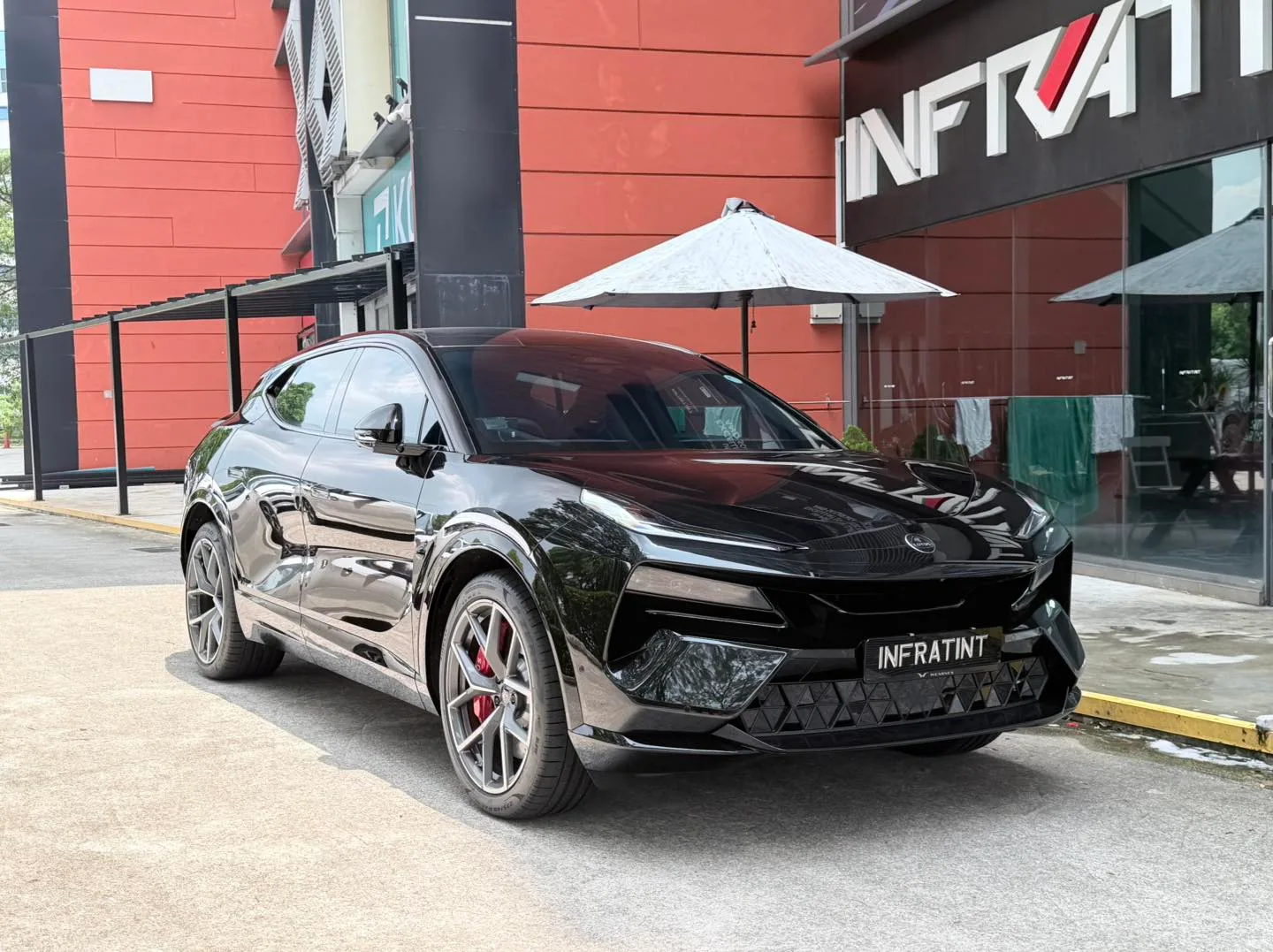Tinted Lotus Eletre front three-quarter view at Infratint Singapore
