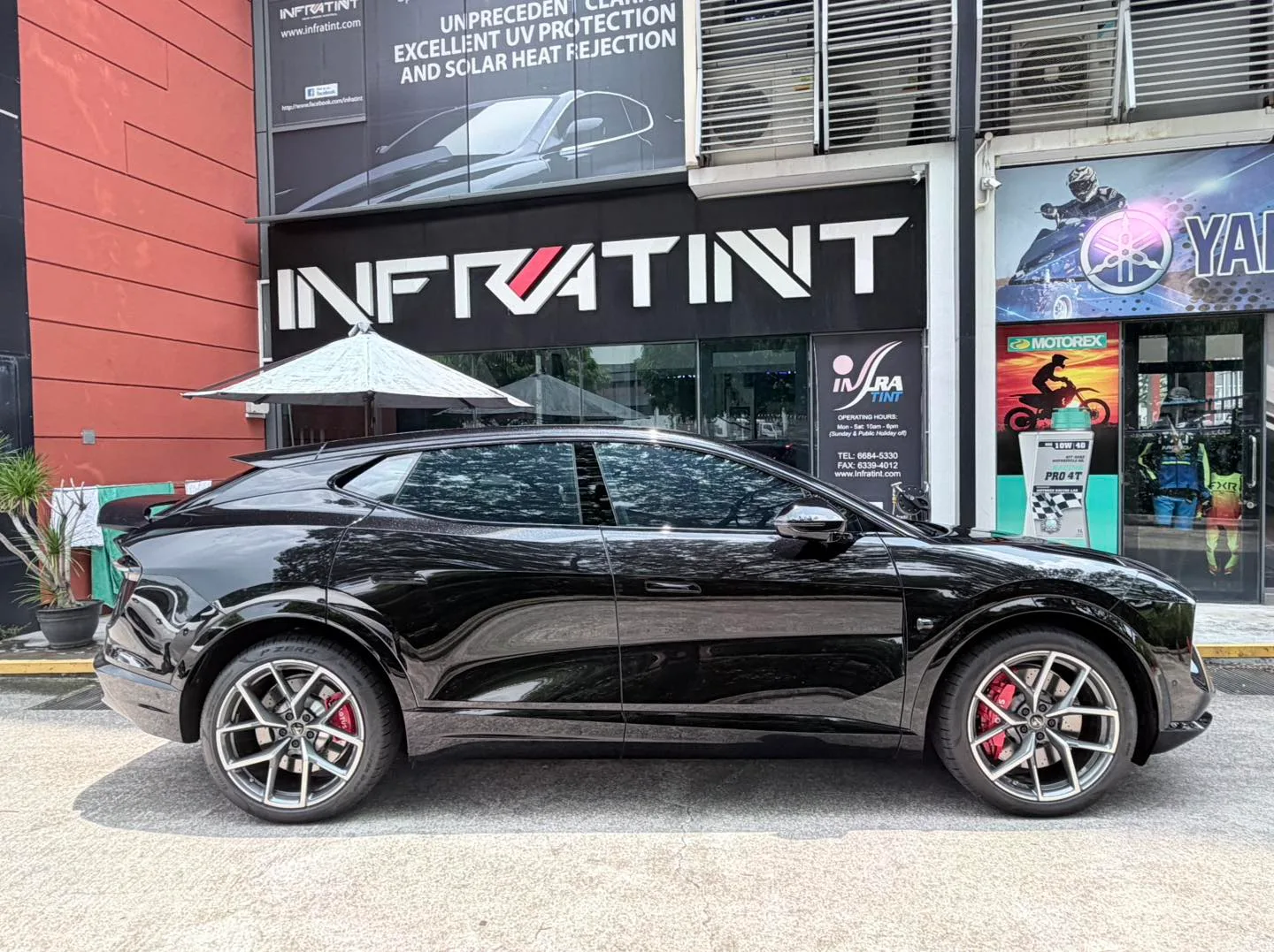 Tinted Lotus Eletre side profile outside Infratint Singapore