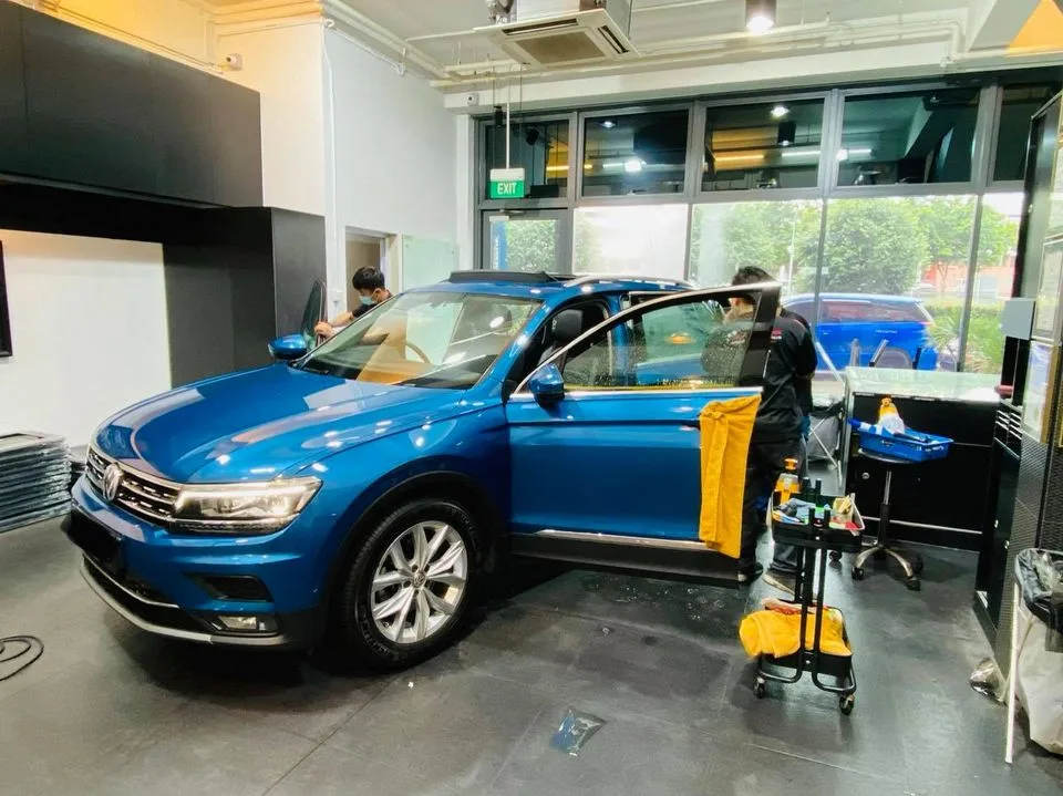 Blue Volkswagen Tiguan having window film fitted at Infratint Singapore