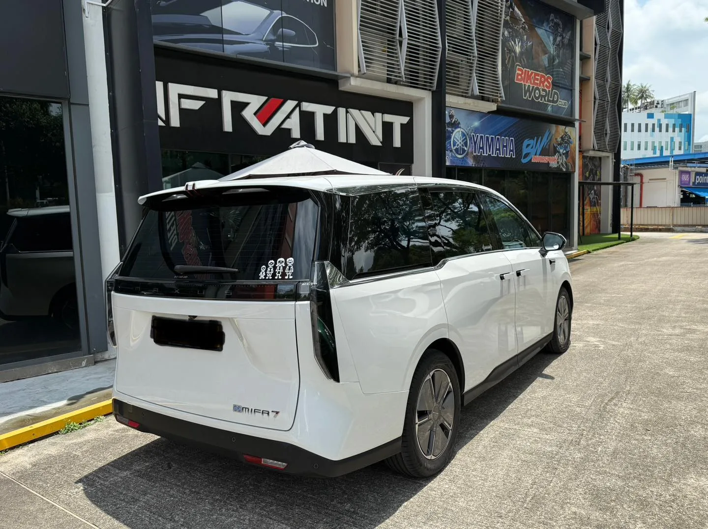 White Maxus MIFA 7 rear three-quarter view with tinted glass at Infratint Singapore
