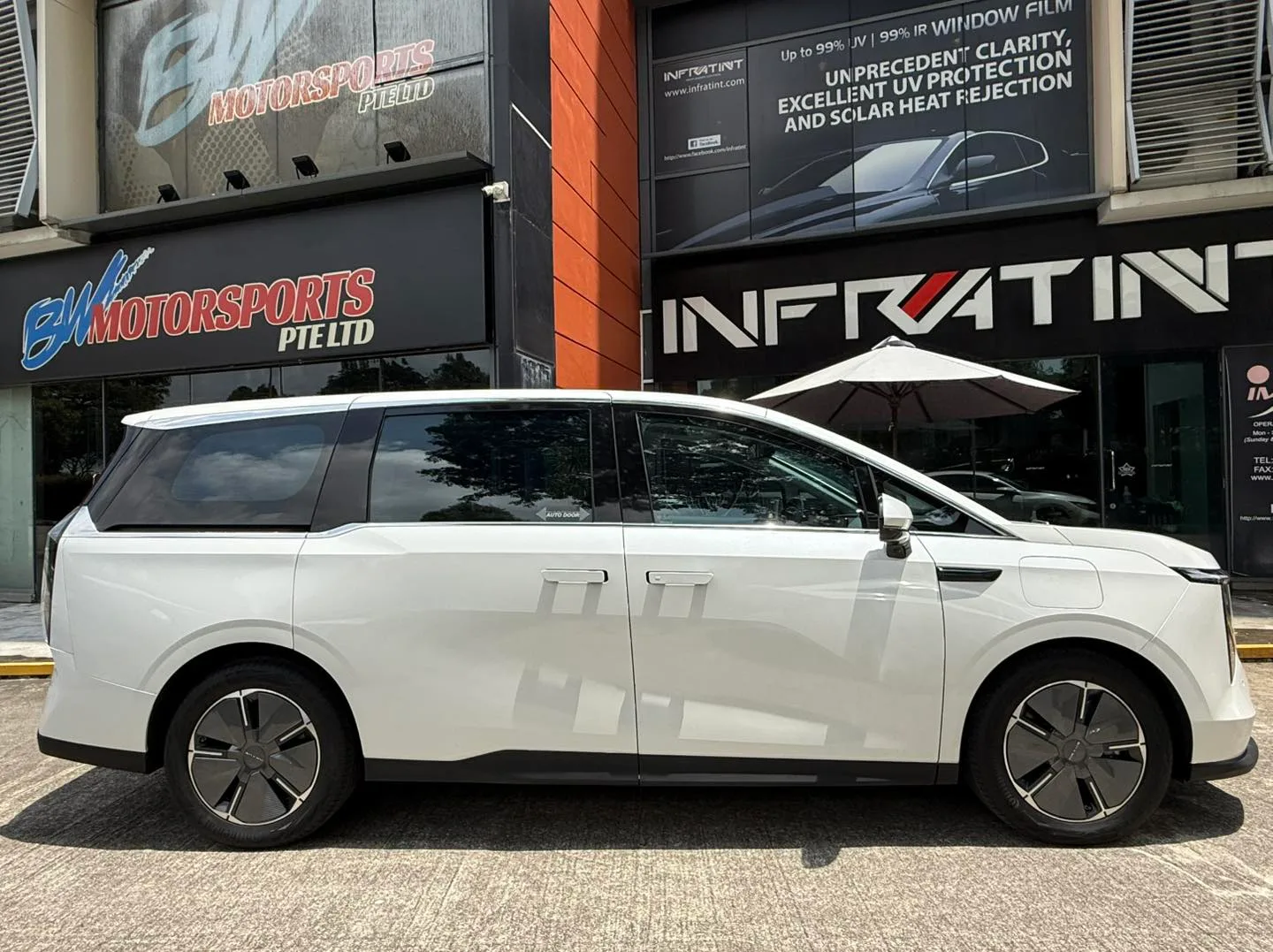 White Maxus MIFA 7 side profile with tinted windows at Infratint Singapore