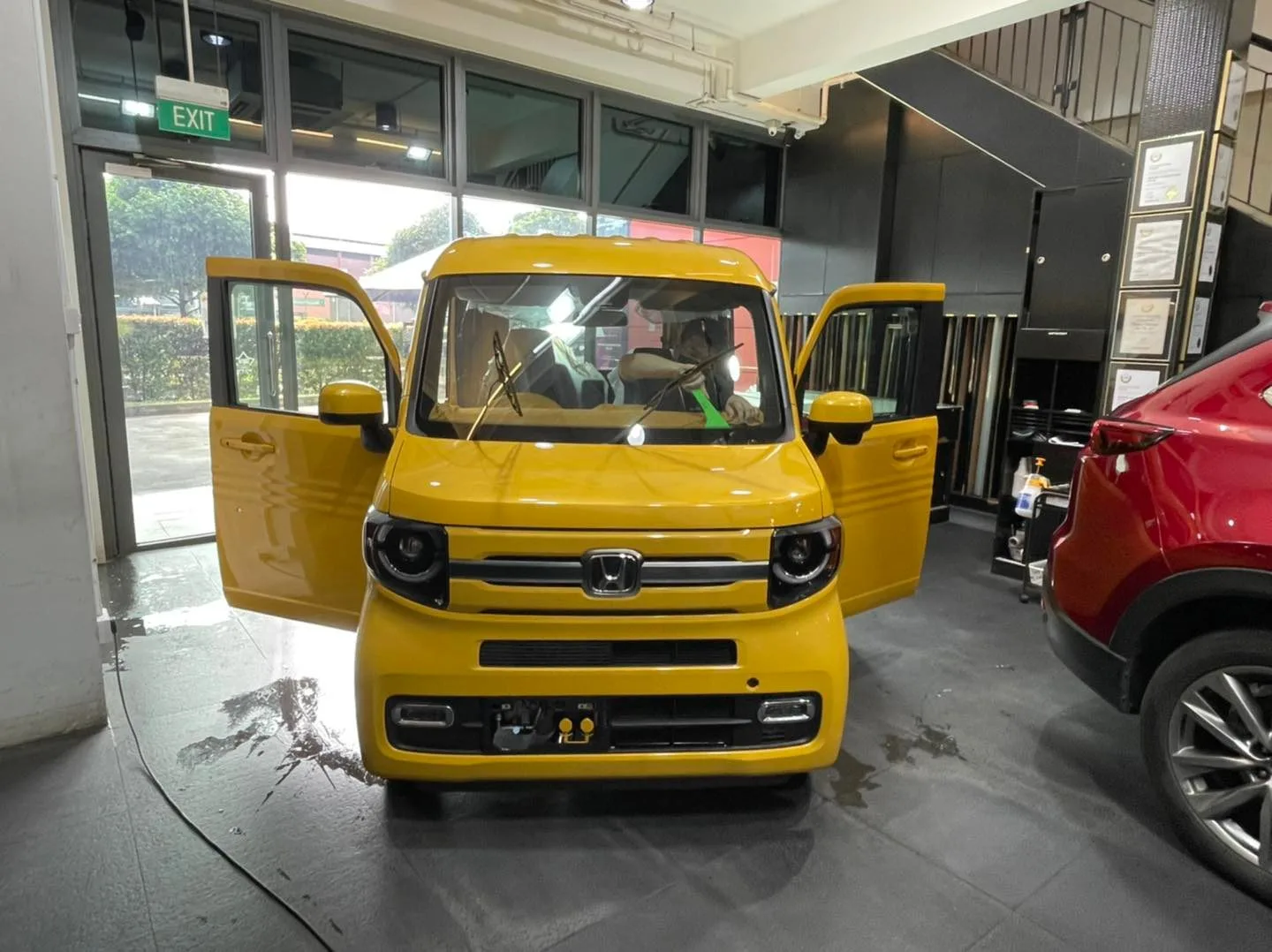 Yellow Honda N-Van with doors open at Infratint Singapore for window film