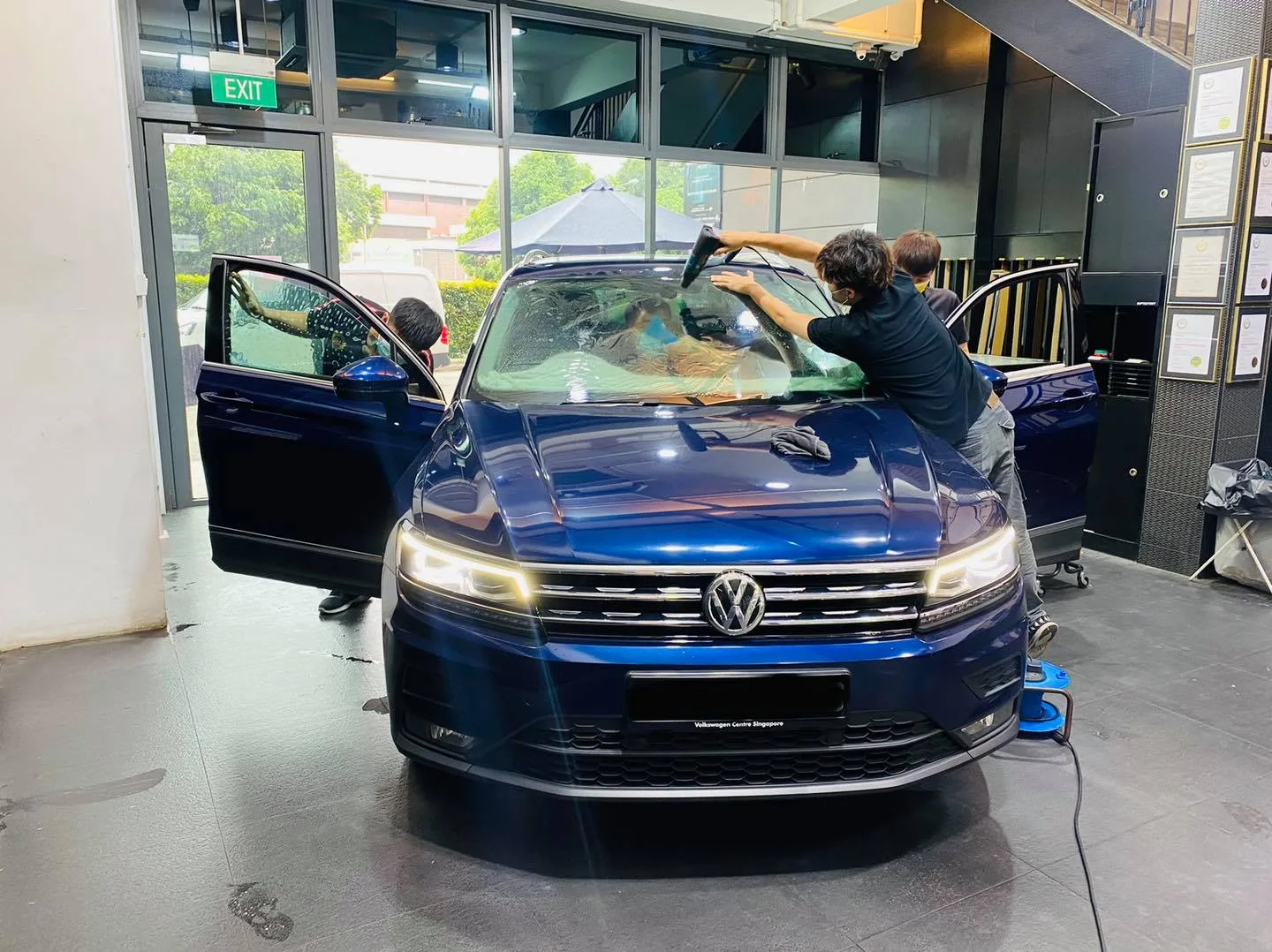 Blue Volkswagen Tiguan being tinted at Infratint Singapore